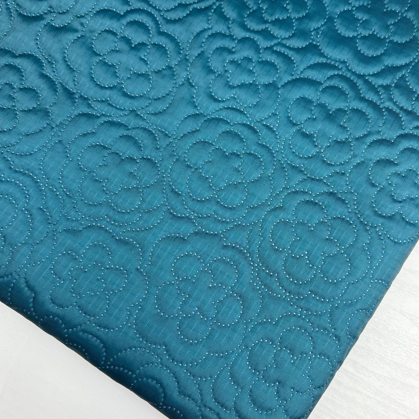 Rose Stamp Quilted Nylon Water and Scratch Resistant Fabric