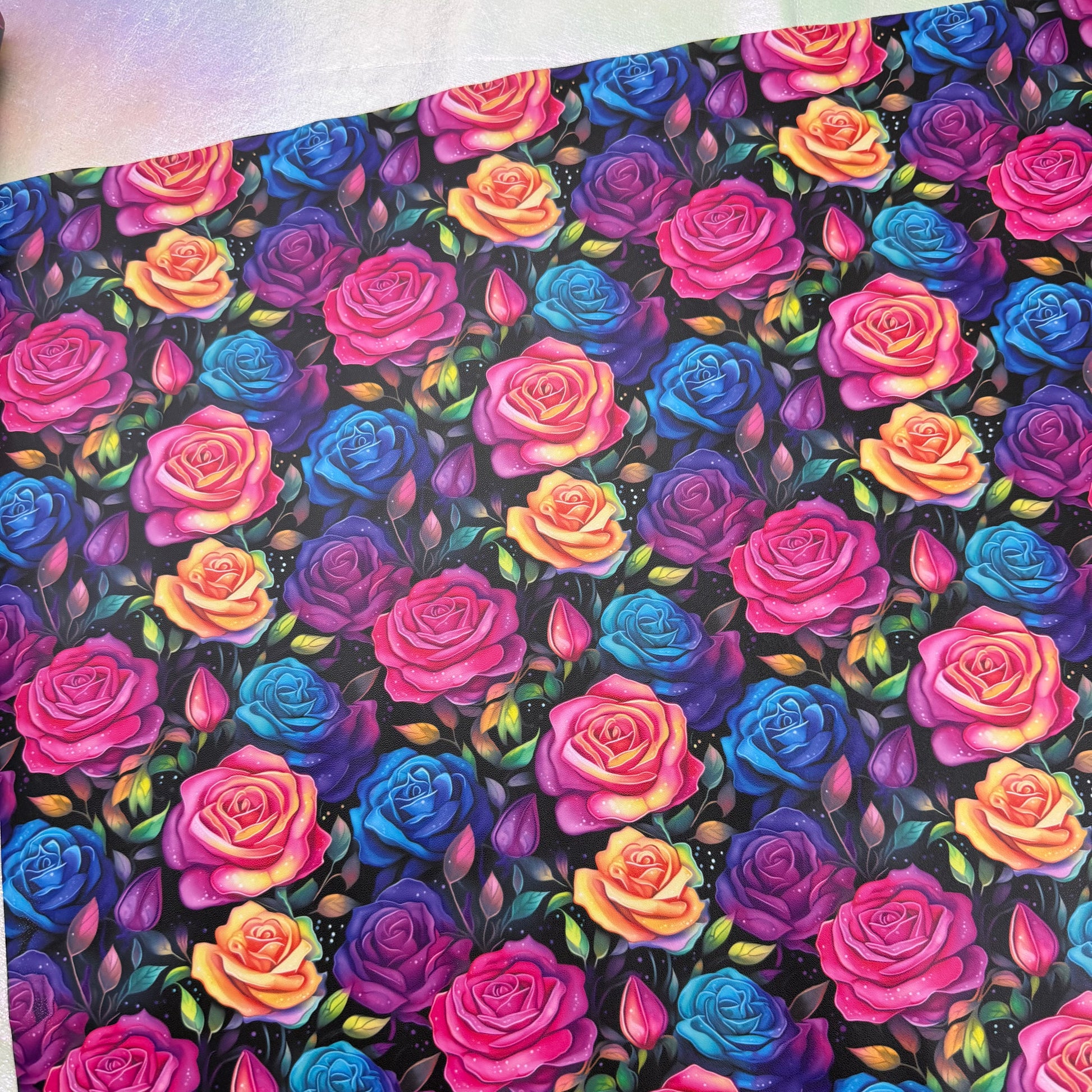 Colorful rose pattern on a black background